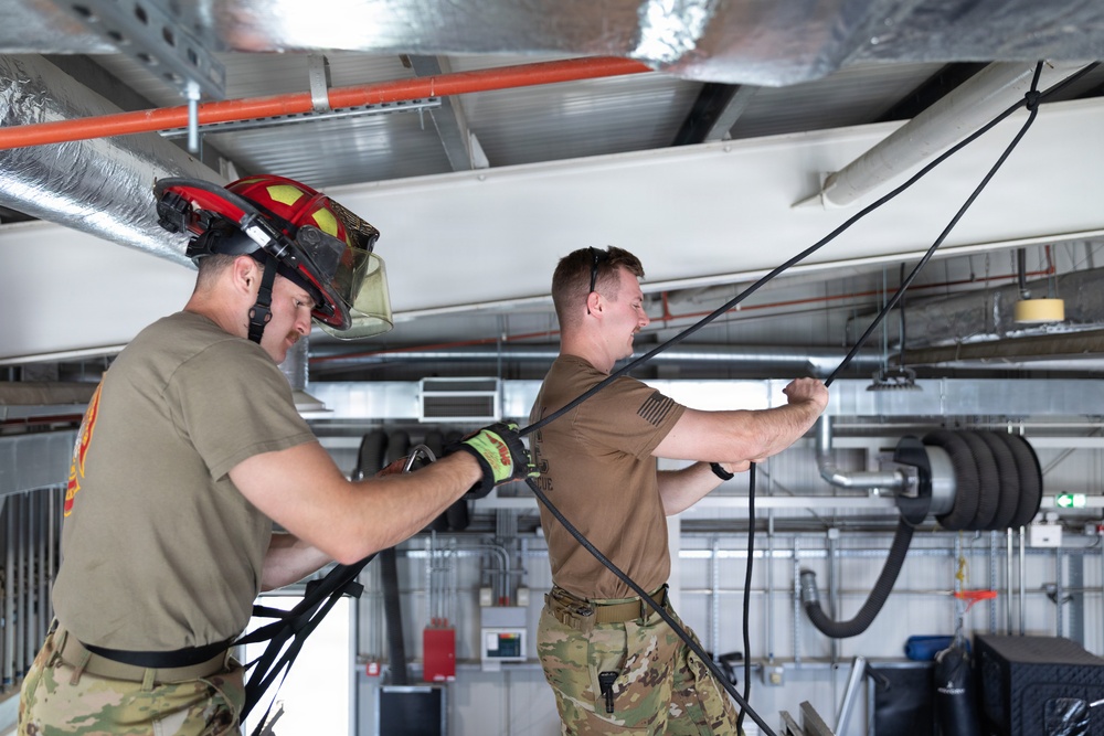 U.S. Army Firefighters conduct rappelling training
