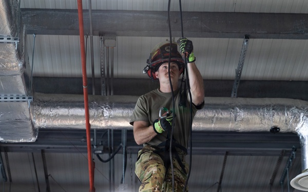 U.S. Army Firefighters conduct rappelling training