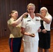 Navy Music promotes Commander Cartwright