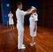 Navy Music promotes Commander Cartwright