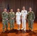 Navy Music promotes Commander Cartwright