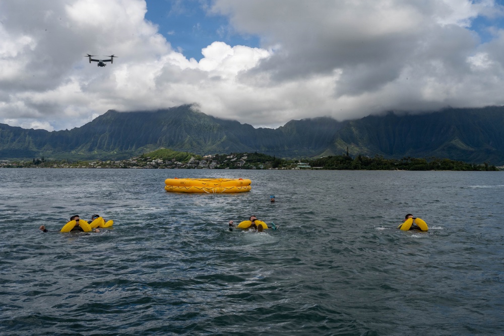 15 OSS SERE team conduct water survival training with Marine Corps