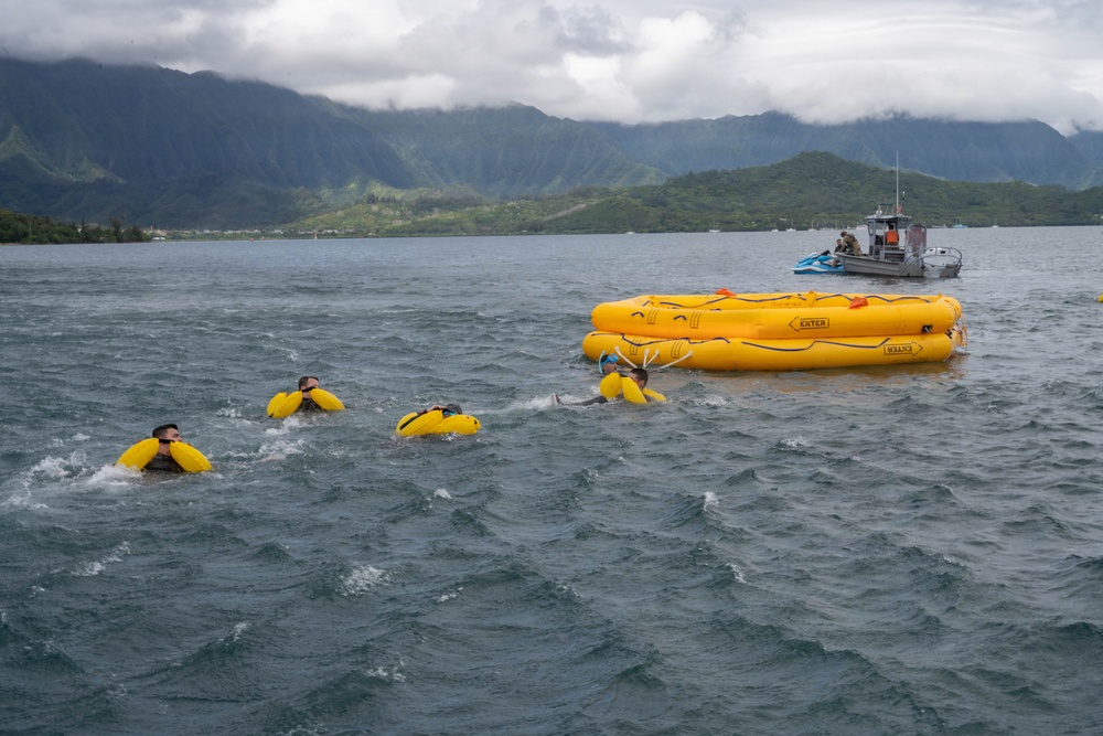 15 OSS SERE team conduct water survival training with Marine Corps