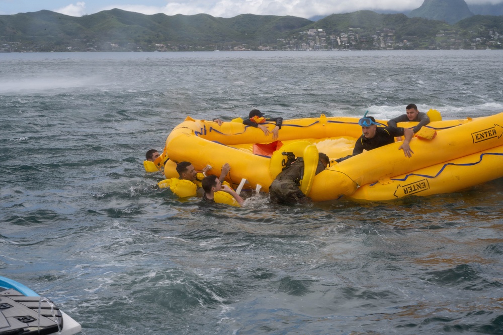 15 OSS SERE team conduct water survival training with Marine Corps