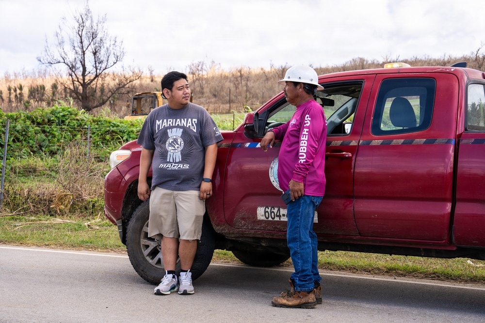 Linemen in Tinian Repair Power Lines