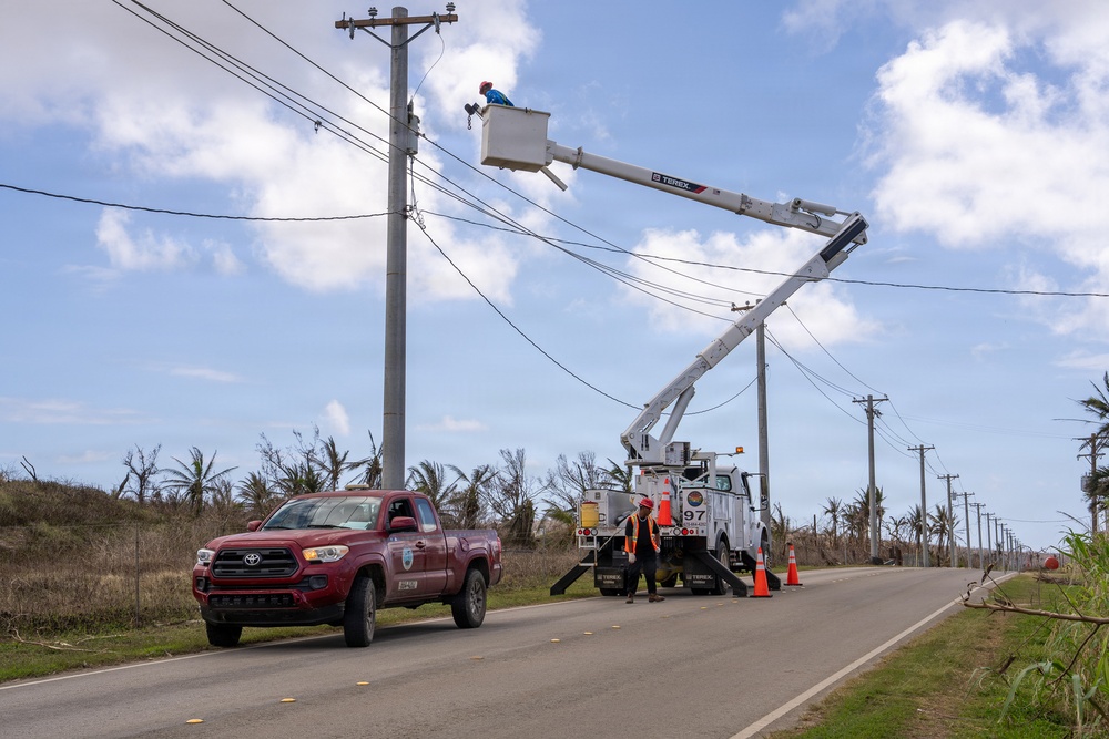 Linemen in Tinian Repair Power Lines