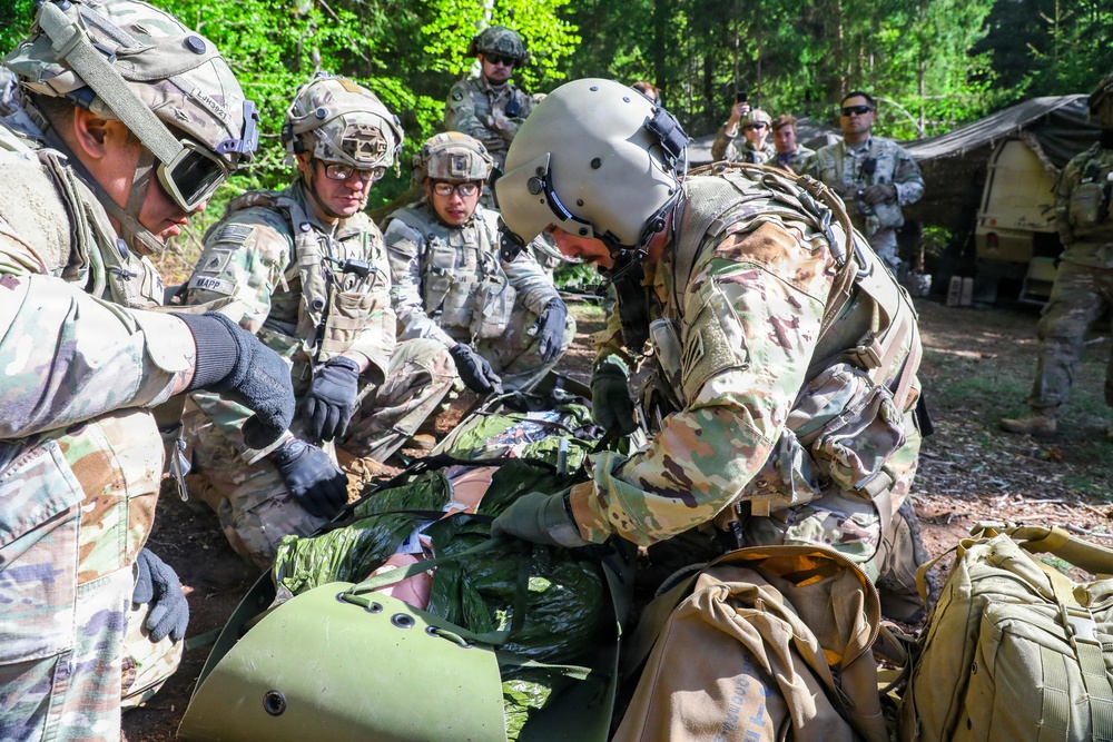 Putting casualty in a litter