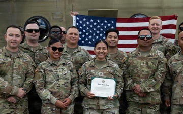 94th AAMDC Reenlists on Helicopter Airfield