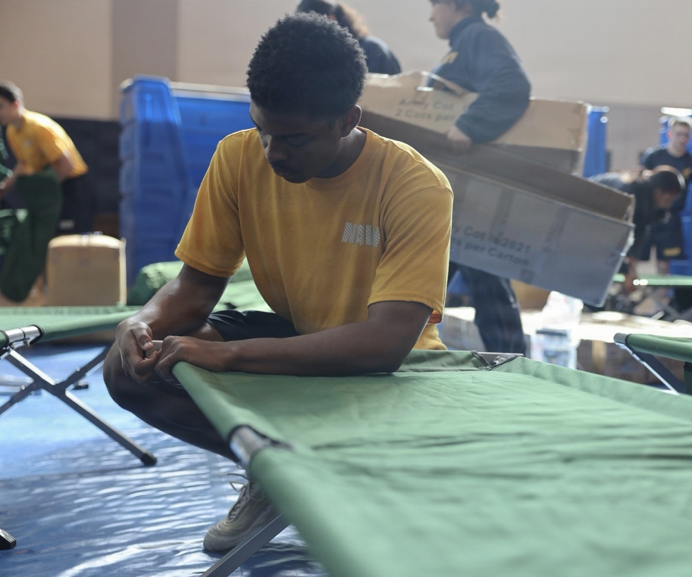 Joint Base Pearl Harbor-Hickam personnel practice emergency shelter operations during Hurricane Exercise 2026 to enhance preparedness for major weather events.