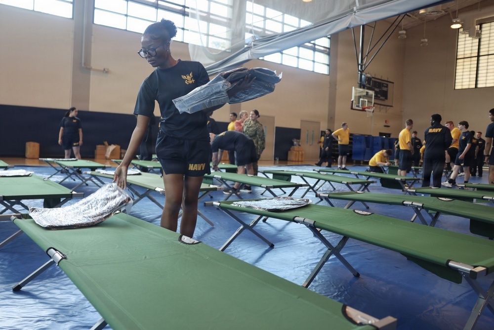 Joint Base Pearl Harbor-Hickam personnel practice emergency shelter operations during Hurricane Exercise 2026 to enhance preparedness for major weather events.
