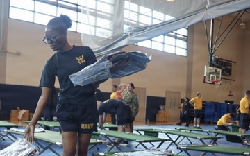 Joint Base Pearl Harbor-Hickam personnel practice emergency shelter operations during Hurricane Exercise 2026 to enhance preparedness for major weather events.