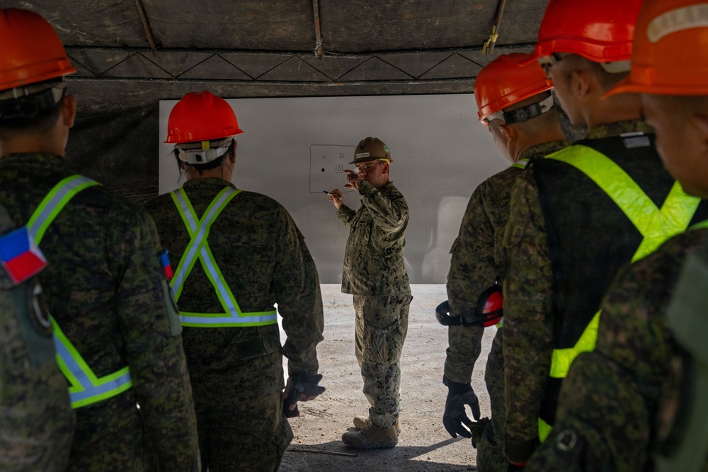 NMCB 11 and Philippine Army conduct rapid airfield damage repair during BK26