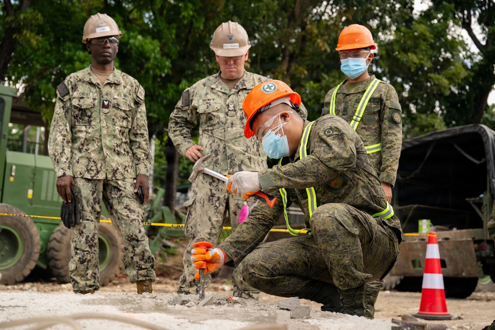 NMCB 11 and Philippine Army conduct rapid airfield damage repair during BK26