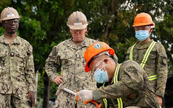 NMCB 11 and Philippine Army conduct rapid airfield damage repair during BK26