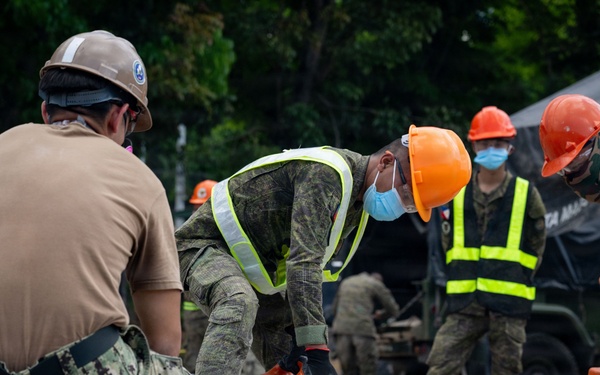 NMCB 11 and Philippine Army conduct rapid airfield damage repair during BK26