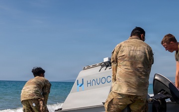 U.S. Soldiers prepare and launch an Unmanned Surface Vessel in the Philippines