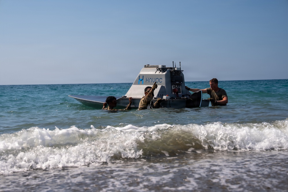 U.S. Soldiers prepare and launch an Unmanned Surface Vessel in the Philippines