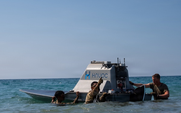 U.S. Soldiers prepare and launch an Unmanned Surface Vessel in the Philippines