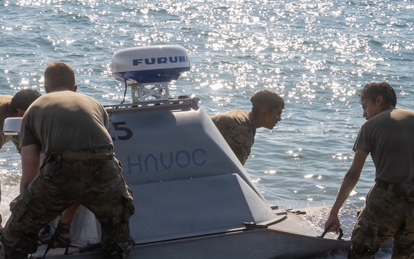 U.S. Soldiers prepare and launch an Unmanned Surface Vessel in the Philippines