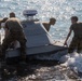 U.S. Soldiers prepare and launch an Unmanned Surface Vessel in the Philippines