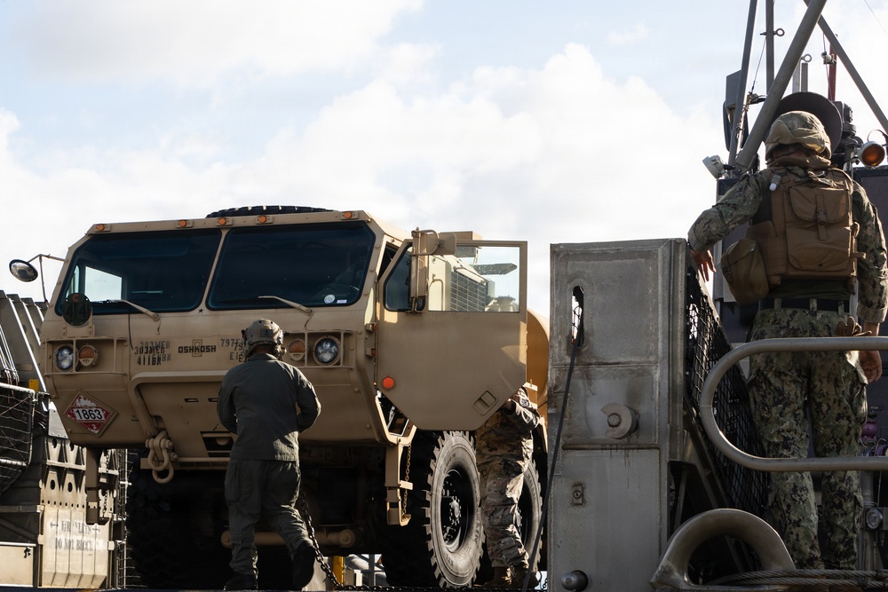 Assault Craft Unit 5 Sailors Conduct Fuel Vehicle Transport