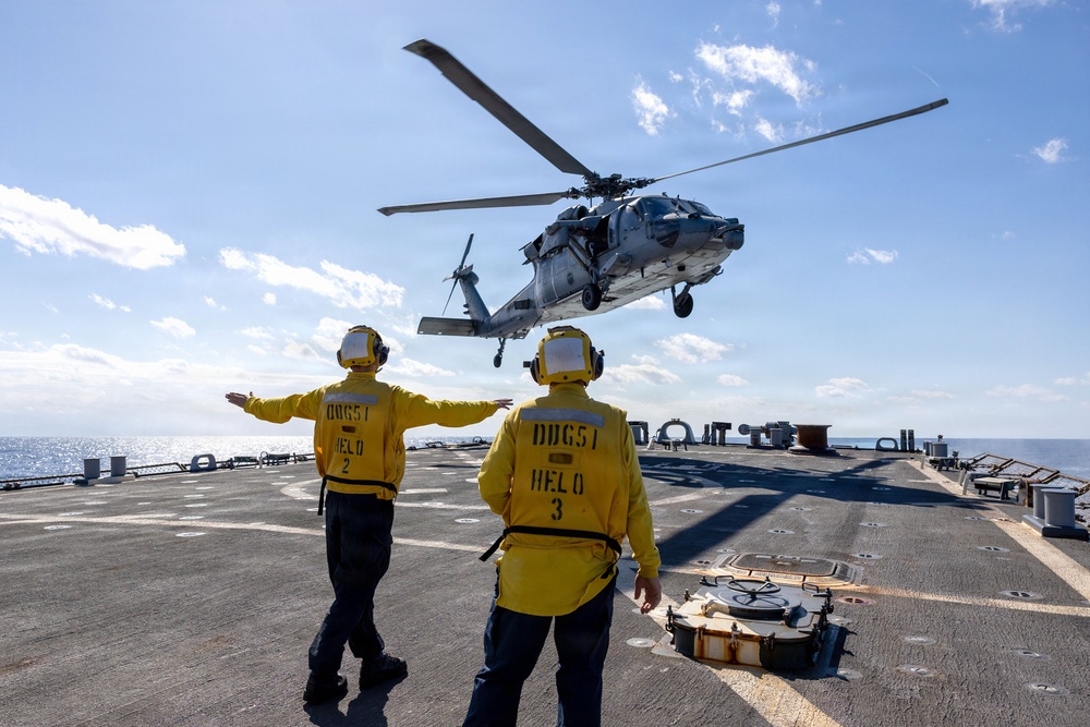 A MH-60R Seahawk of Helicopter Maritime Strike Squadron (HSM) 46 to take off from the flight deck of the USS Arleigh Burke (DDG 51)