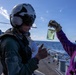 Sailors conduct fuel sample check prior to fueling a MH-60R Seahawk of HSM-46 on the USS Arleigh Burke