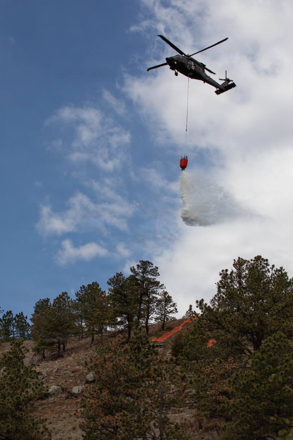 South Dakota National Guard conducts Black Hawk wildfire suppression drill at Angostura Reservoir