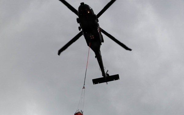 South Dakota National Guard conducts Black Hawk wildfire suppression drill at Angostura Reservoir