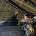F-16 Fighting Falcon pilot conducts pre-flight inspections
