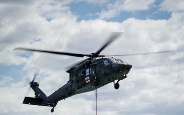 South Dakota National Guard conducts Black Hawk wildfire suppression drill at Angostura Reservoir