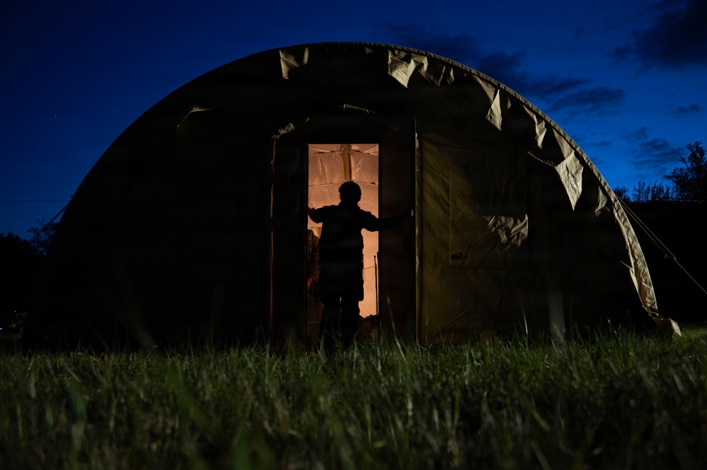 Airmen operate through field conditions during 316th Wing bivouac exercise