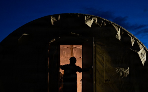 Airmen operate through field conditions during 316th Wing bivouac exercise