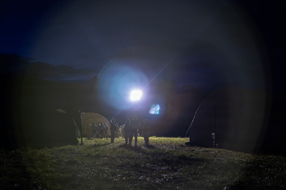 Airmen operate through field conditions during 316th Wing Bivouac exercise