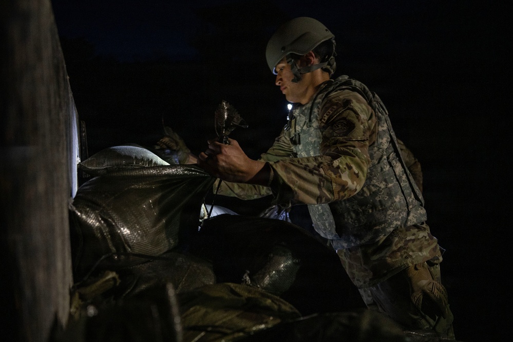 Airmen operate through field conditions during 316th Wing Bivouac exercise