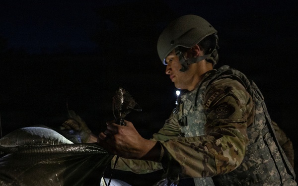 Airmen operate through field conditions during 316th Wing Bivouac exercise
