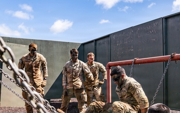 Multinational Soldiers take on the Leadership Reaction Course at the 2026 Pacific Land Forces Team Readiness Challenge