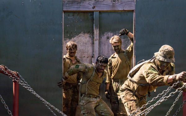 Multinational Soldiers take on the Leadership Reaction Course at the 2026 Pacific Land Forces Team Readiness Challenge