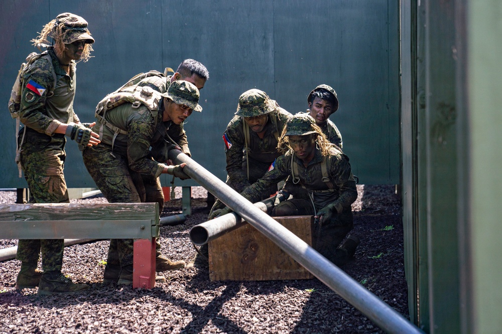 Multinational Soldiers take on the Leadership Reaction Course at the 2026 Pacific Land Forces Team Readiness Challenge