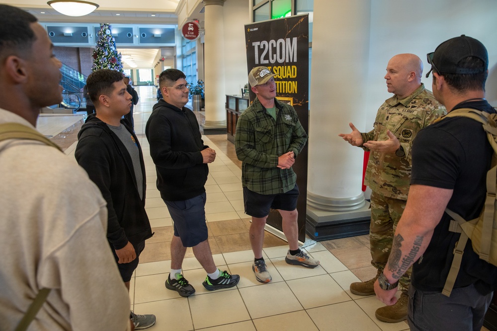 U.S. Army soldier briefs participants at T2COM Squad Competition during holiday season