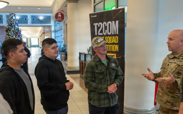 U.S. Army soldier briefs participants at T2COM Squad Competition during holiday season