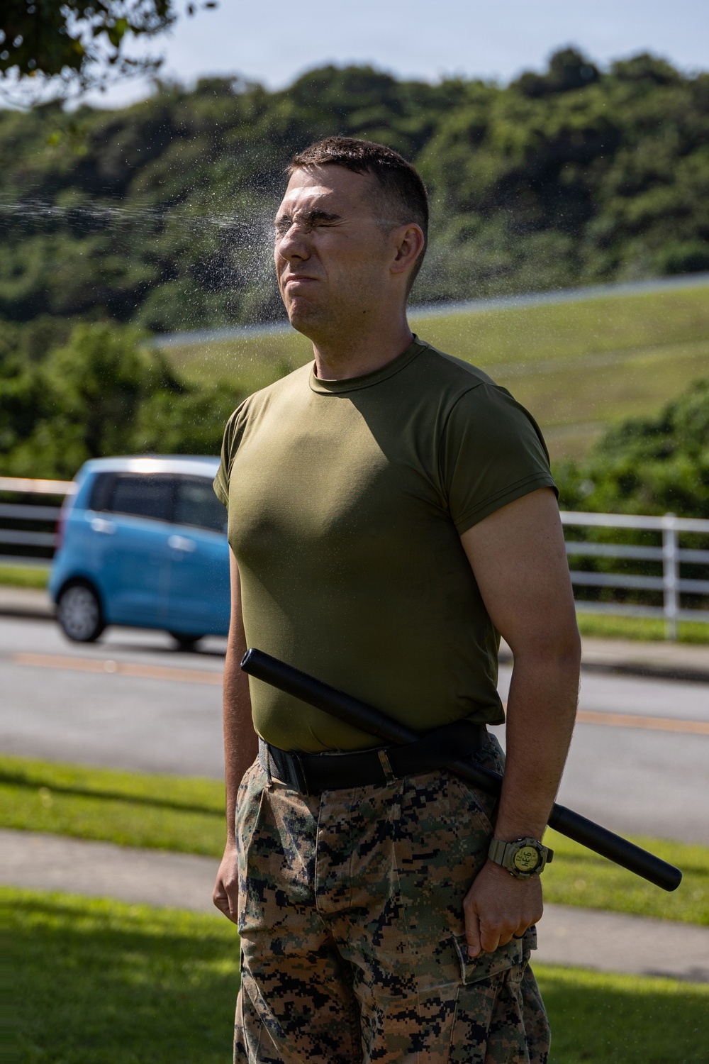 Marines and Japanese Security Guards conduct OC Spray training at Camp Foster