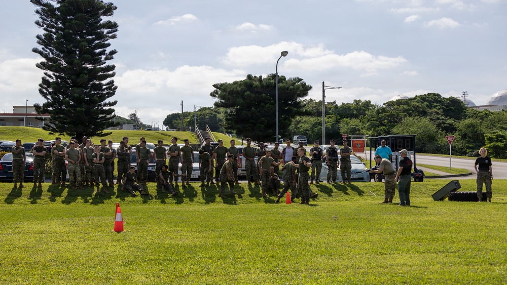 Marines and Japanese Security Guards conduct OC Spray training at Camp Foster