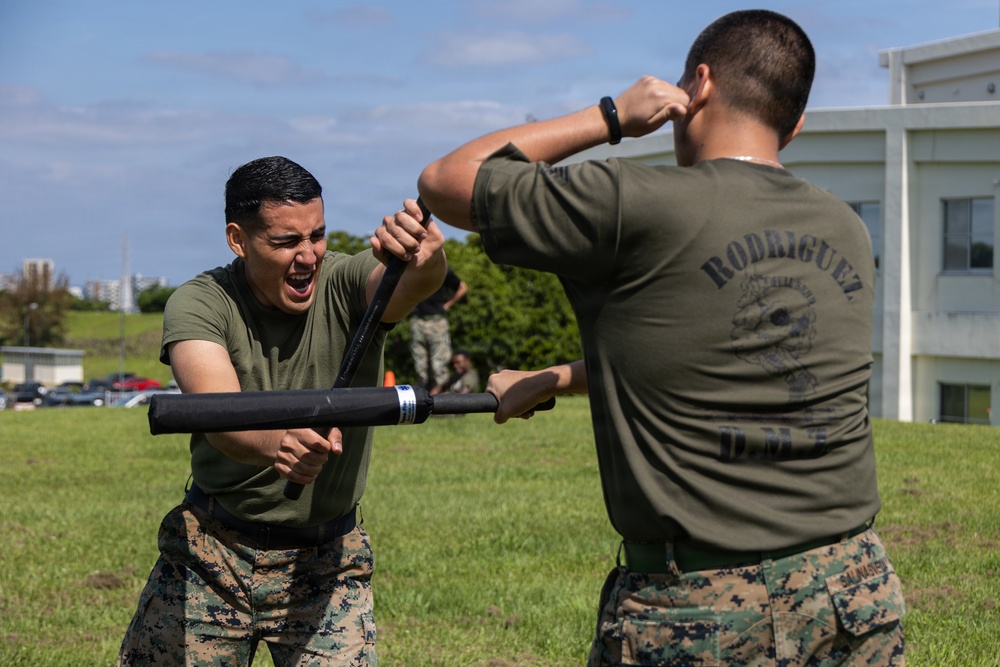 Marines and Japanese Security Guards conduct OC Spray training at Camp Foster
