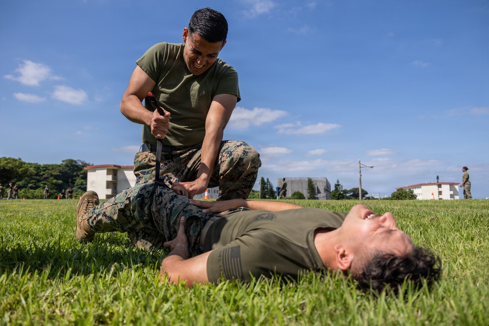 Marines and Japanese Security Guards conduct OC Spray training at Camp Foster