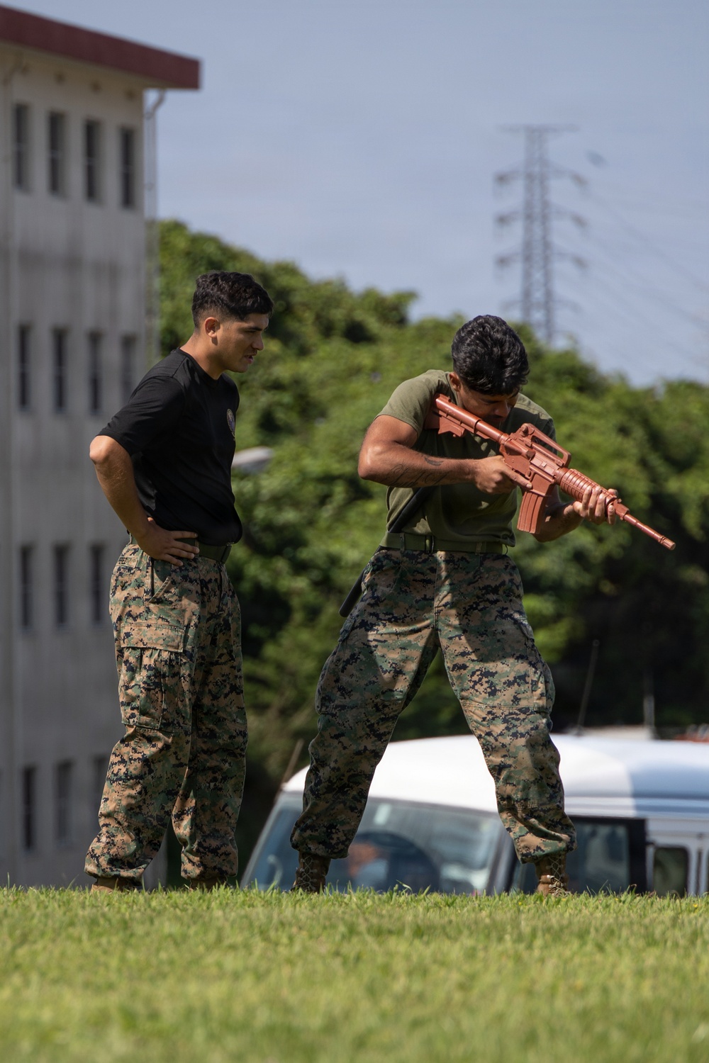 Marines and Japanese Security Guards conduct OC Spray training at Camp Foster