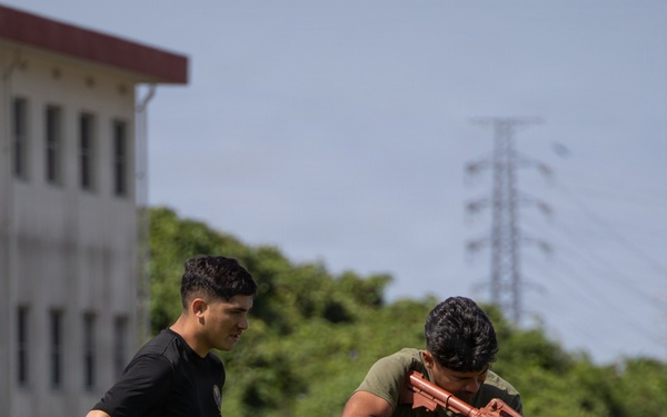 Marines and Japanese Security Guards conduct OC Spray training at Camp Foster