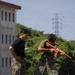 Marines and Japanese Security Guards conduct OC Spray training at Camp Foster