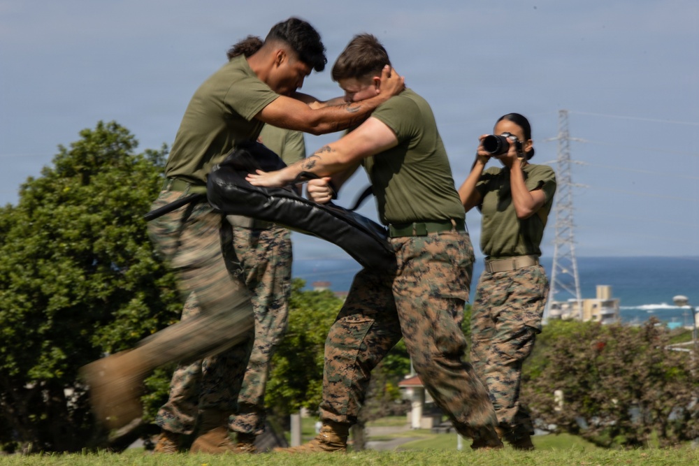 Marines and Japanese Security Guards conduct OC Spray training at Camp Foster