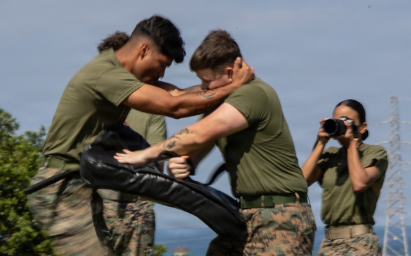 Marines and Japanese Security Guards conduct OC Spray training at Camp Foster